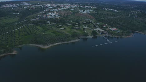 aerial views of clube nautico de montargil dam, alentejo, portugal 4k