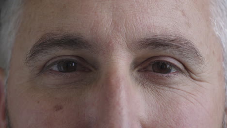 close-up-mature-man-opening-eyes-looking-at-camera-healthy-eyesight