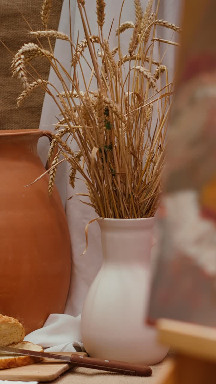 Still Life with Terracotta Pot, Wheat Stalks in Vase, and Sliced Bread