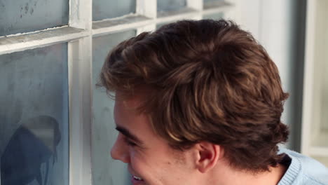 attractive man drinking coffee at home