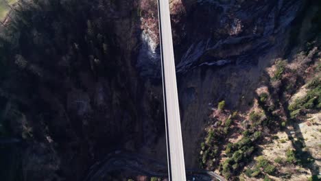 drone flying above the tamina bridge and gorge in switzerland