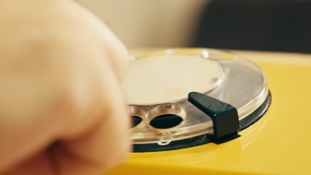 Retro vintage phone, A yellow rotary telephone is displayed on a wooden desk, adding a nostalgic touch