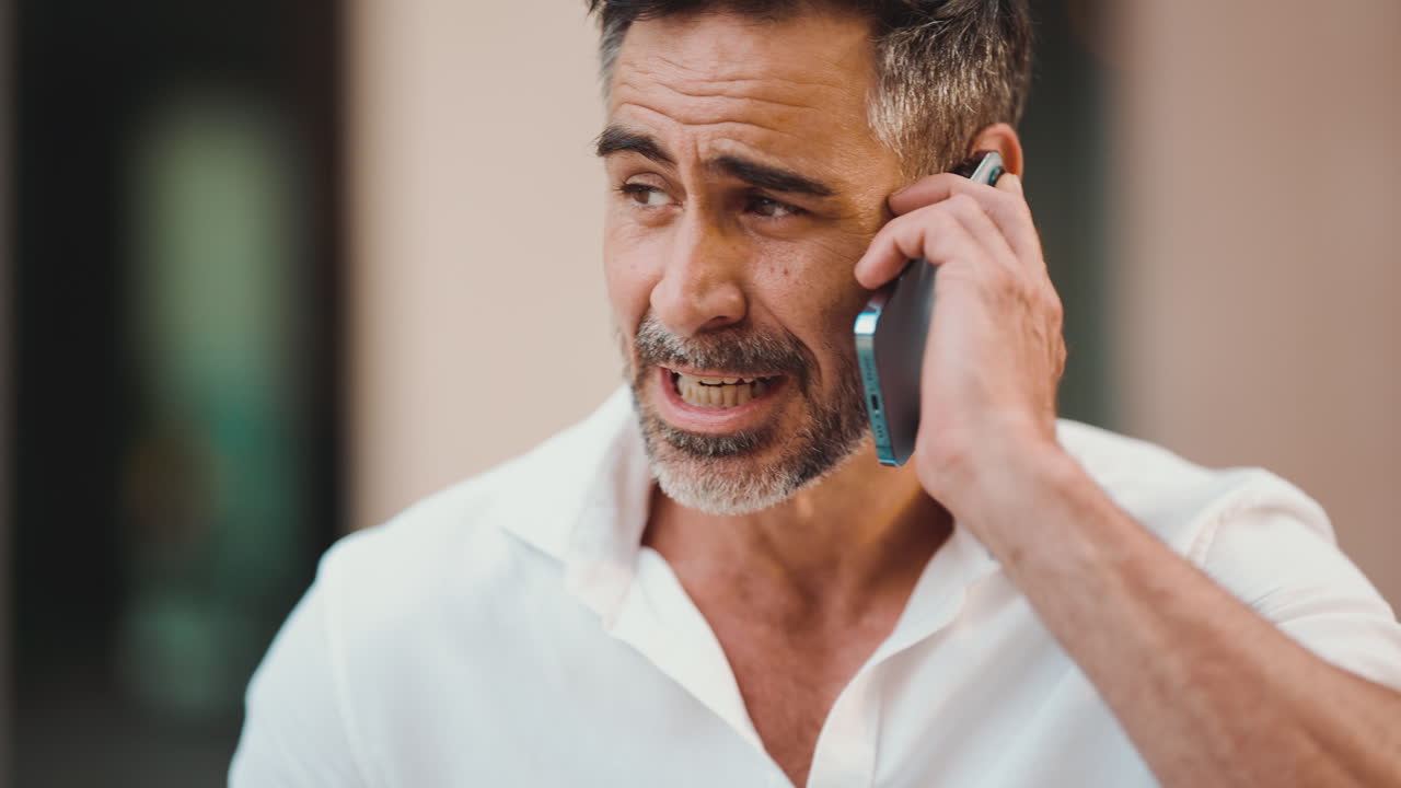 Man Talking on Cell Phone