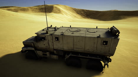 heavy duty vehicle traverses sandy dunes under a bright sun at noon