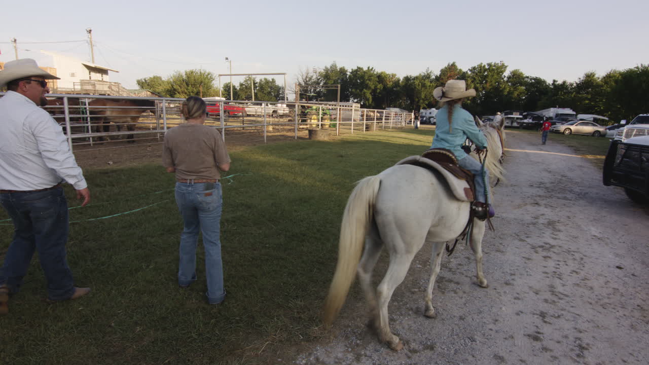 Girl Riding Horse at Rodeo
