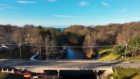 facing the crisp waters of lake michigan from above a small bridge