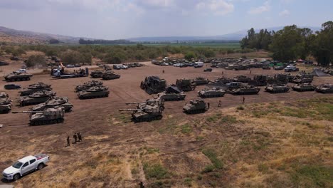 Aerial-view-of-Israeli-armoured-vehicles-in-formation-ready-to-advance-into-Gaza