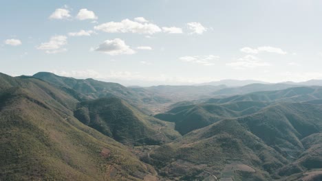 aerial drone view of green mountains in hierve el agua, oaxaca