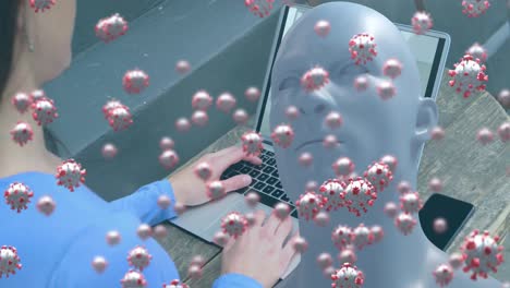 animation of human bust and covid 19 cells over businesswoman on laptop video call