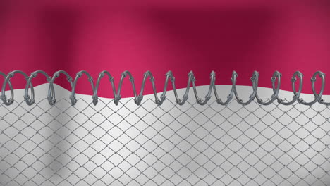 chain-link fence with barbed wire animation over red and white background