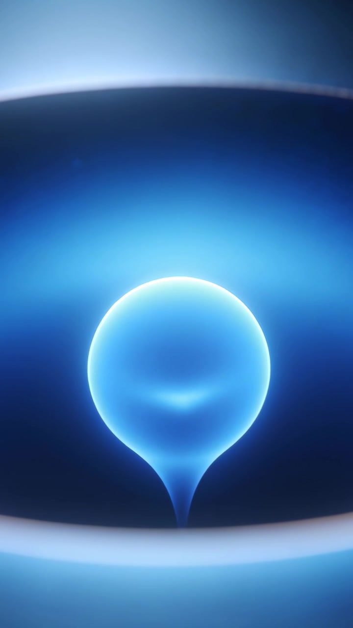 Vertical video: Emerging luminous tip forming droplet, rising into blue glowing sphere above rim