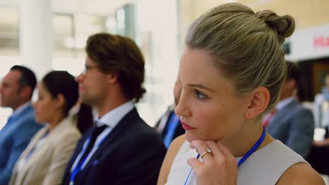 businesswoman using laptop in a seminar 4k