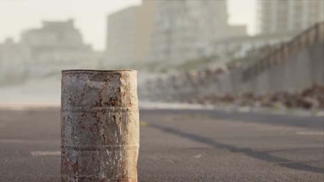 old-rusty-metal-barrel-on-the-street