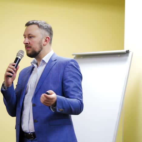 man giving presentation at conference