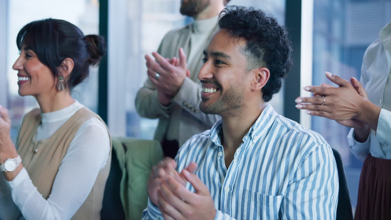 Group of Business Professionals Applauding and Celebrating Success