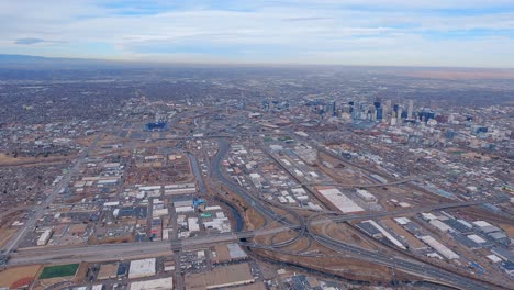 Aerial-view-of-a-Downtown-Denver-looking-down-from-a-small-airplane-flying-over-I-25
