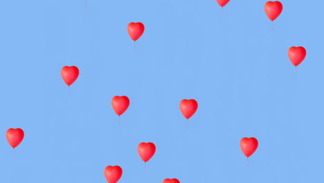 red heart-shaped balloons floating on blue background animation