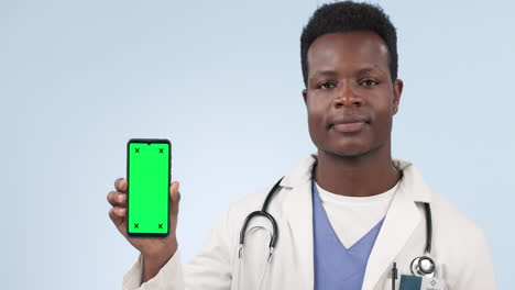 doctor, smartphone and happy man pointing to green