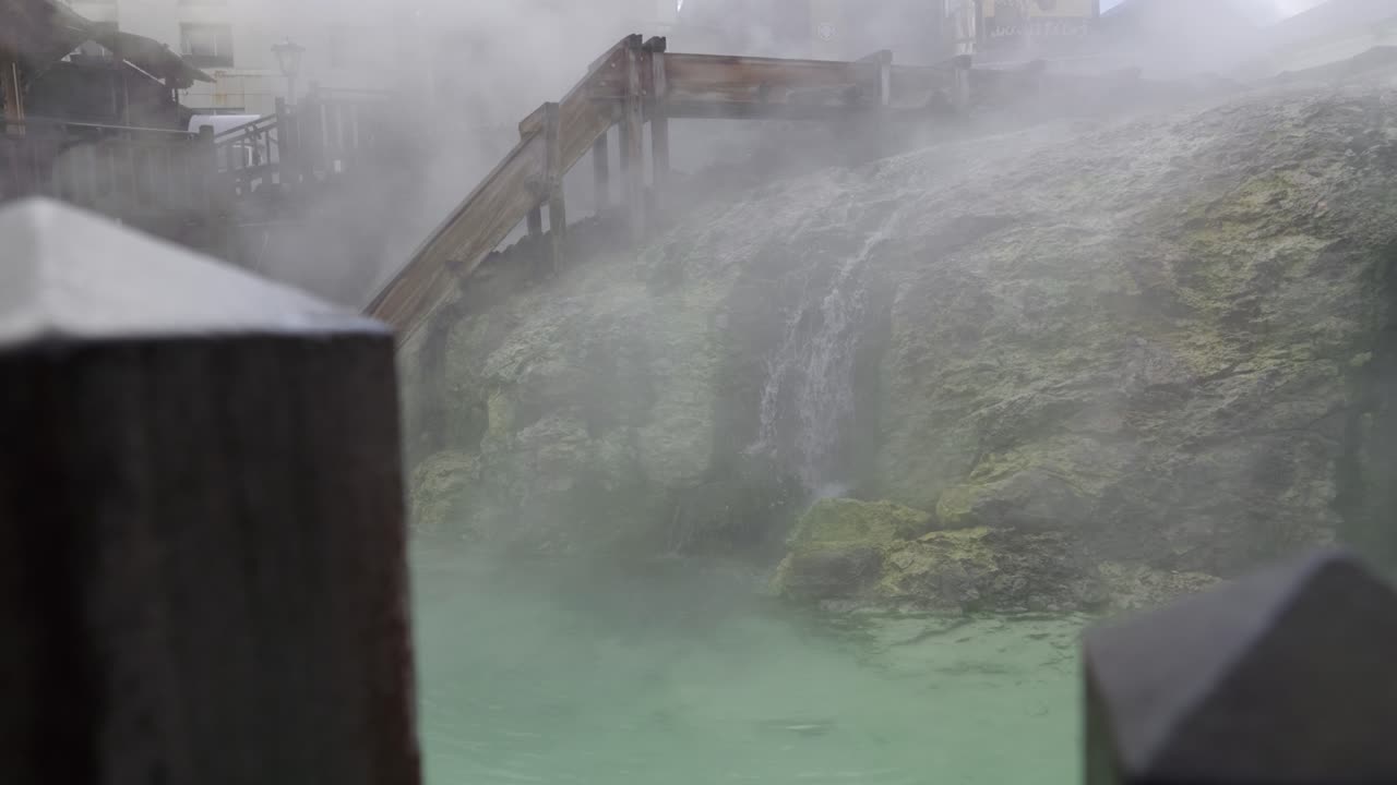 Yubatake Onsen fields in Kusatsu Onsen, slow motion cinematic slider