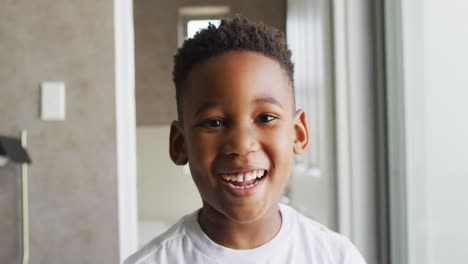 video of african american boy smiling at camera