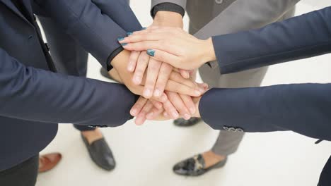 close-up of stack hand of businessman handshake for teamwork of business merger partnership and business deal,successful negotiate,hand shake,