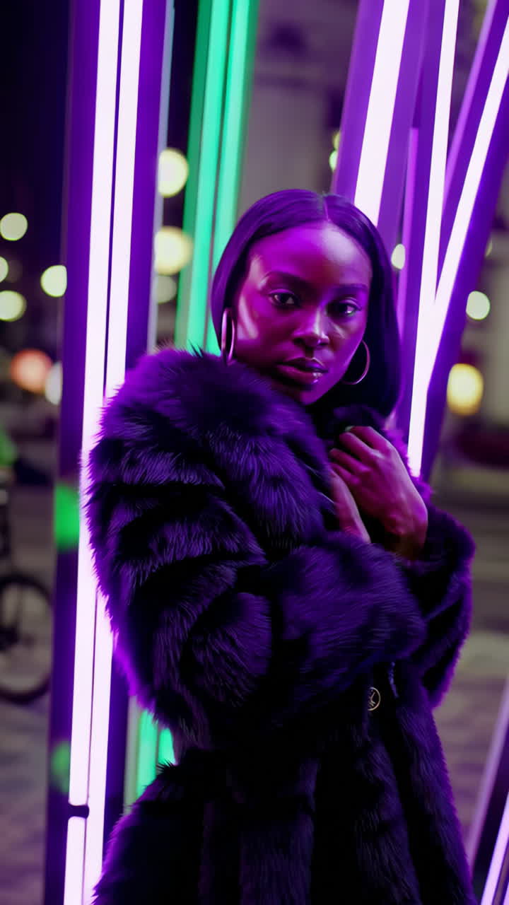 Stylish Woman Posing in Fur Coat Against Neon Lights