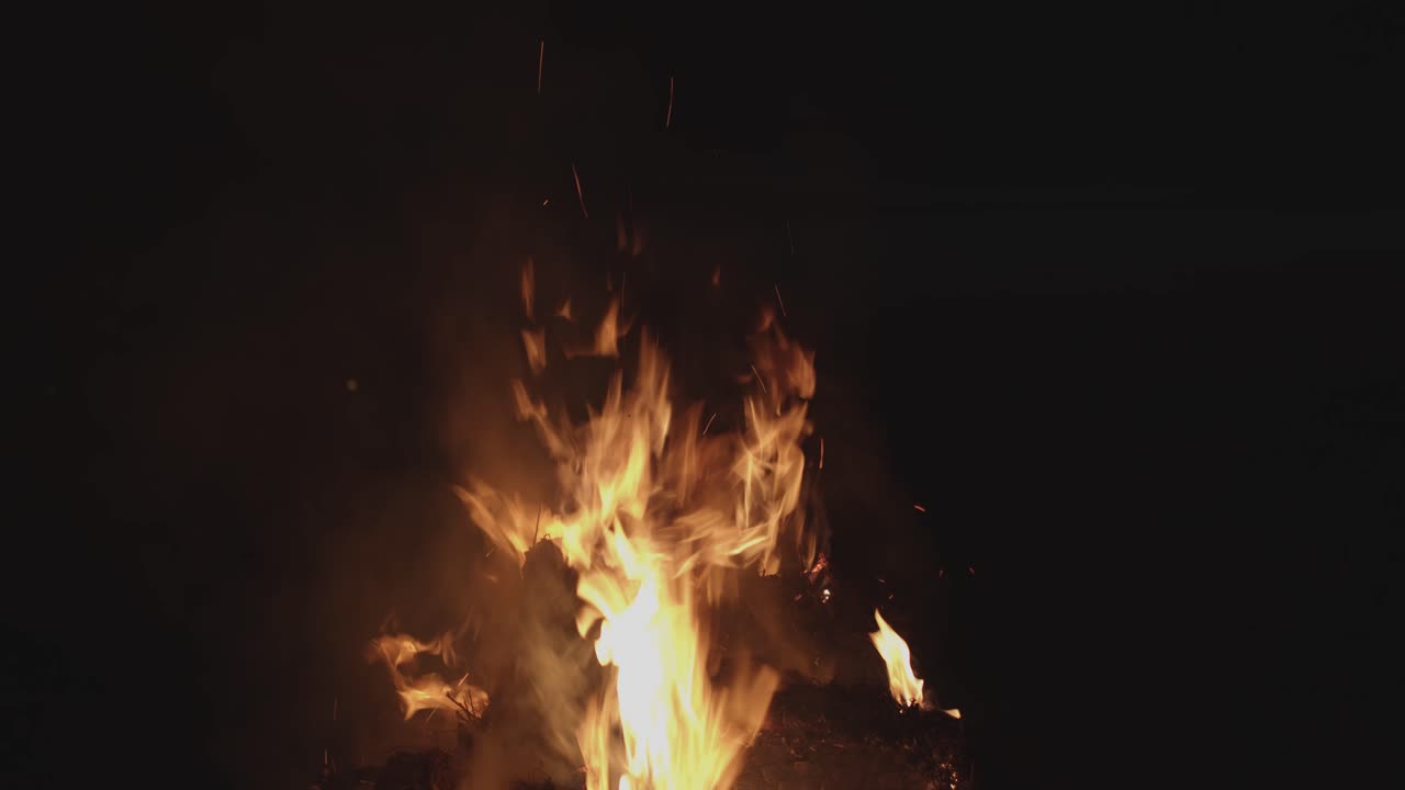 Big Campfire Huge Flames In Wind Dark Night
