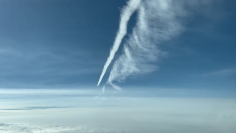 aerial view of the wake of an airplane flying ahead as seen by the pilots of a jet