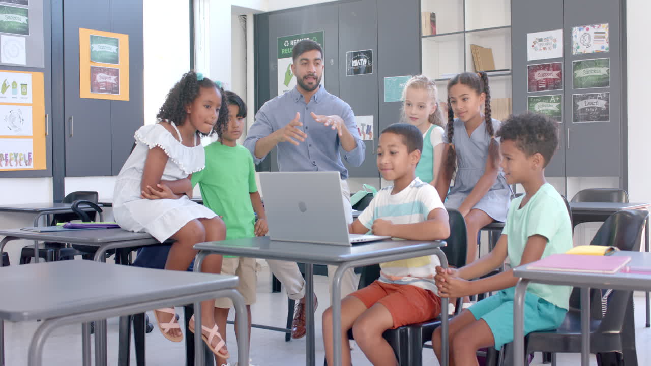 Teacher engages with diverse students in a classroom setting in school