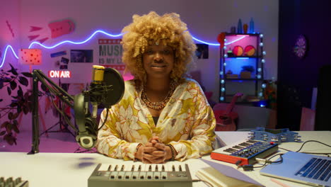 woman radio host in music studio