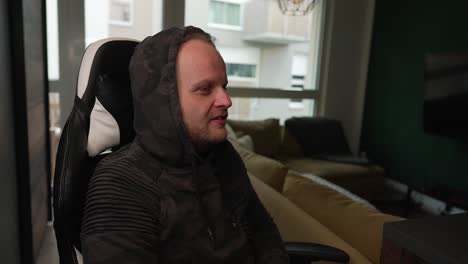 streaming - man talking to camera, gesturing, content creator, medium shot