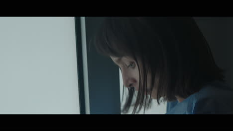 a girl runs through strange corridors of abandoned hospital