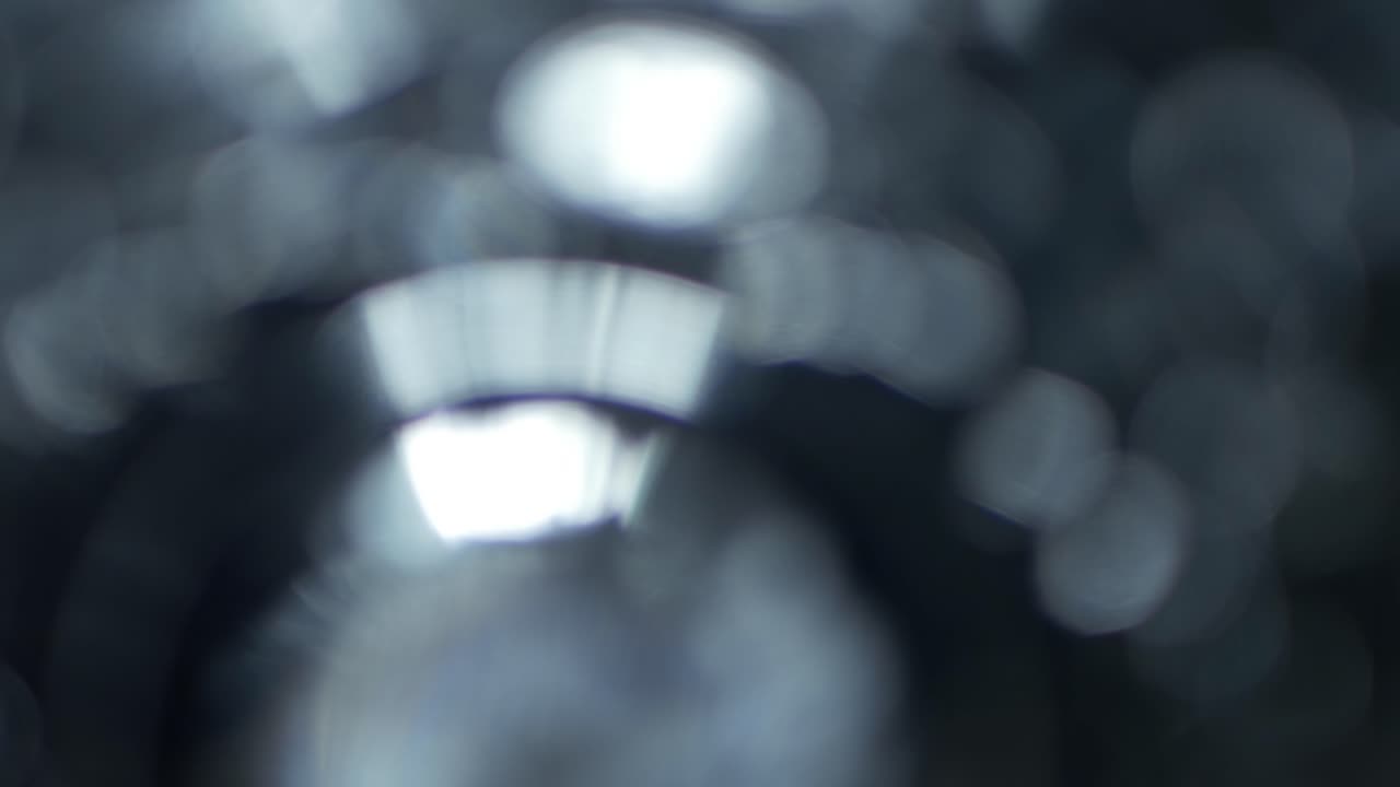 Soft Shifting Bokeh Light Overlay with Blue Flares