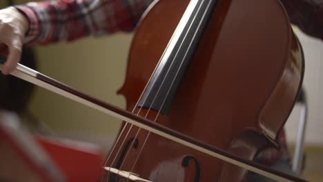 musician playing cello