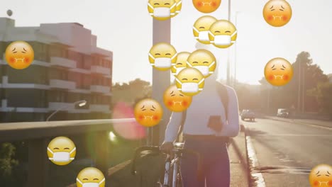 Animation-of-a-woman-with-a-mask-and-a-bike-in-the-street-over-multiple-icons-falling-down