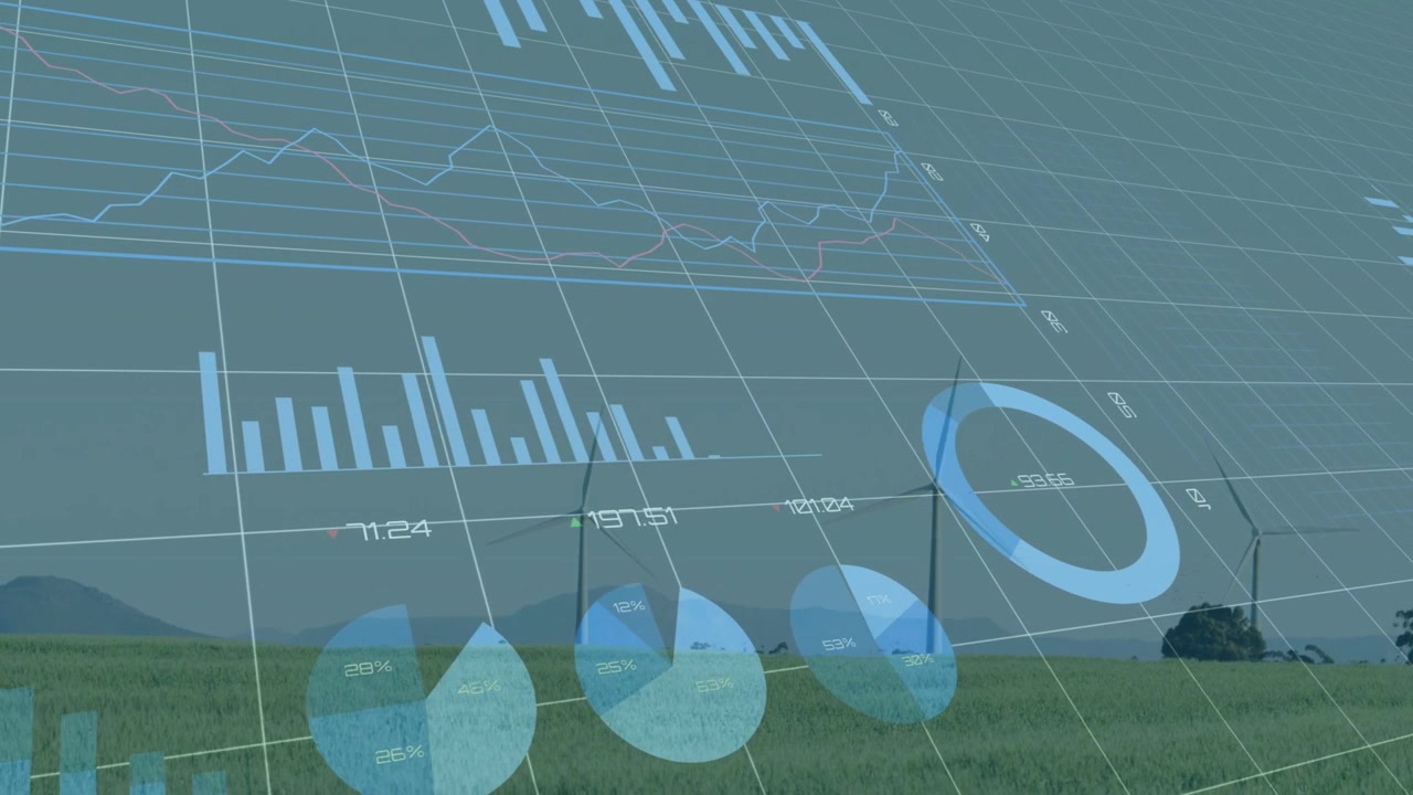 Sensors sending energy metrics to monitor, turbines displaying animated HUD with charts across farm