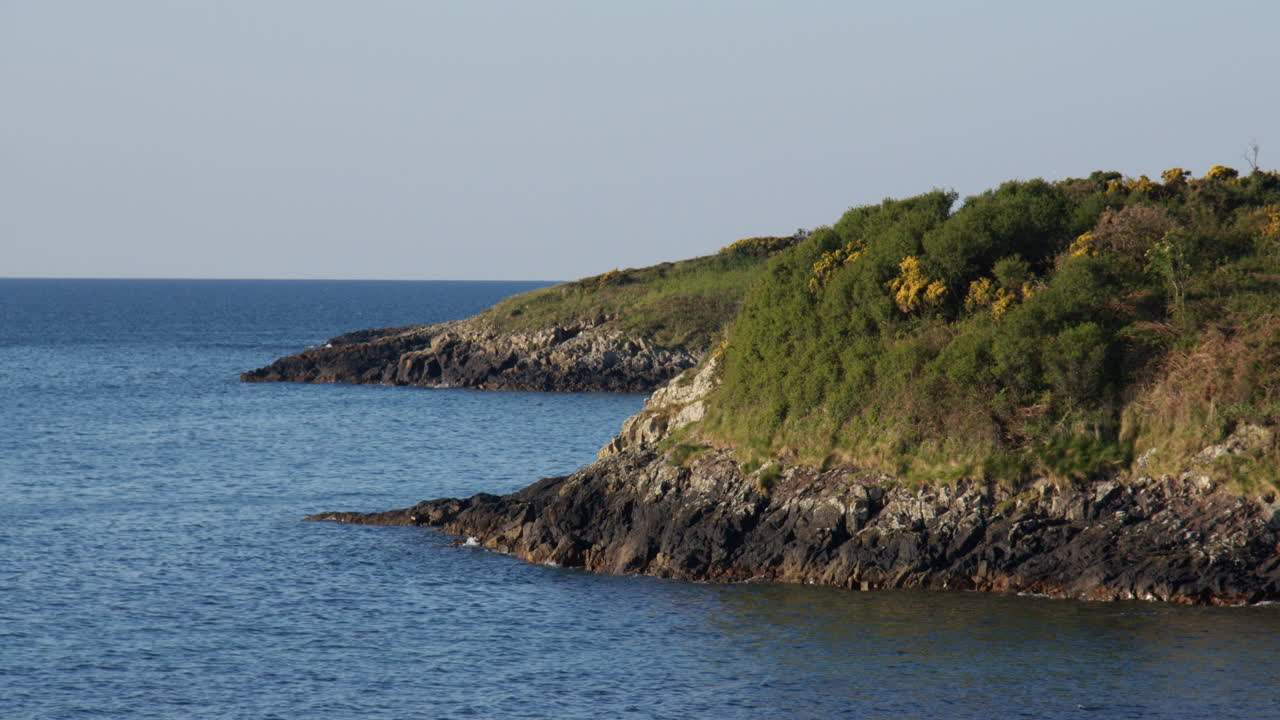 Looking south on the rocky Shoreline at Hafan y Môr on Pen-y-chain, Pwllheli