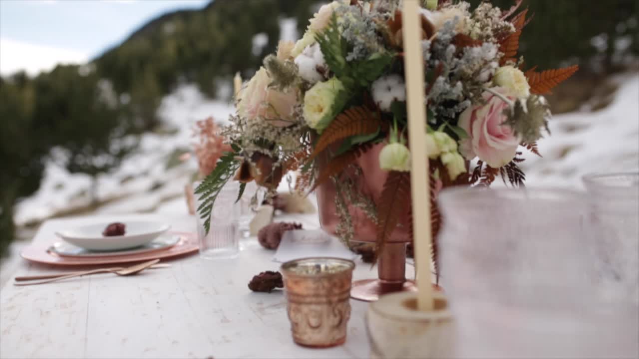 Romantic wedding table in the middle of the mountain