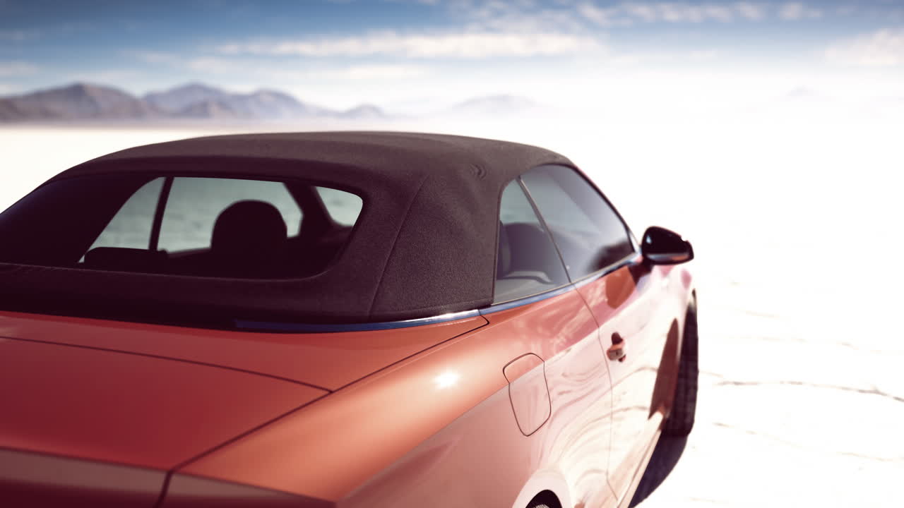 Model of convertible car parked on a salt flat in bright sunlight
