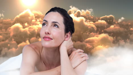 smiling woman with hand on neck over animation of clouds and sunlight