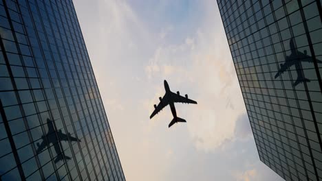 airplane flying over city skyscrapers