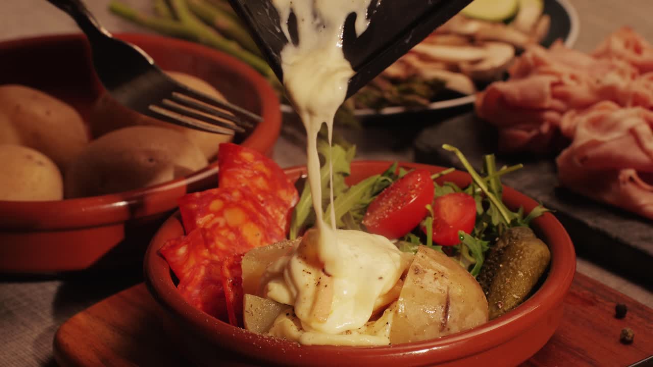 French Swiss or Spanish restaurant with traditional tapas food, Spanish cuisine, delicious tapas and cheese plate, bruschetta with cheese, olives dry tomatoes and tasty sandwich bar appetizer, buffet