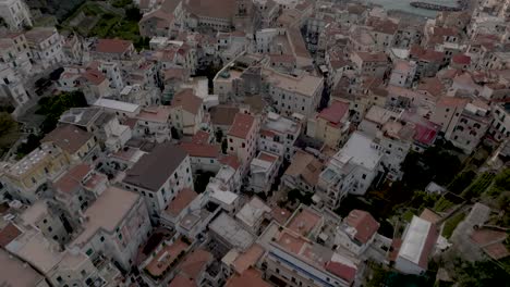 Amalfi,-Italy-at-sunrise-with-drone-video-of-skyline-tilting-up-towards-sea