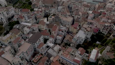 amalfi, italy at sunrise with drone video of skyline tilting up towards sea