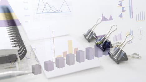 animation of financial data processing over desk