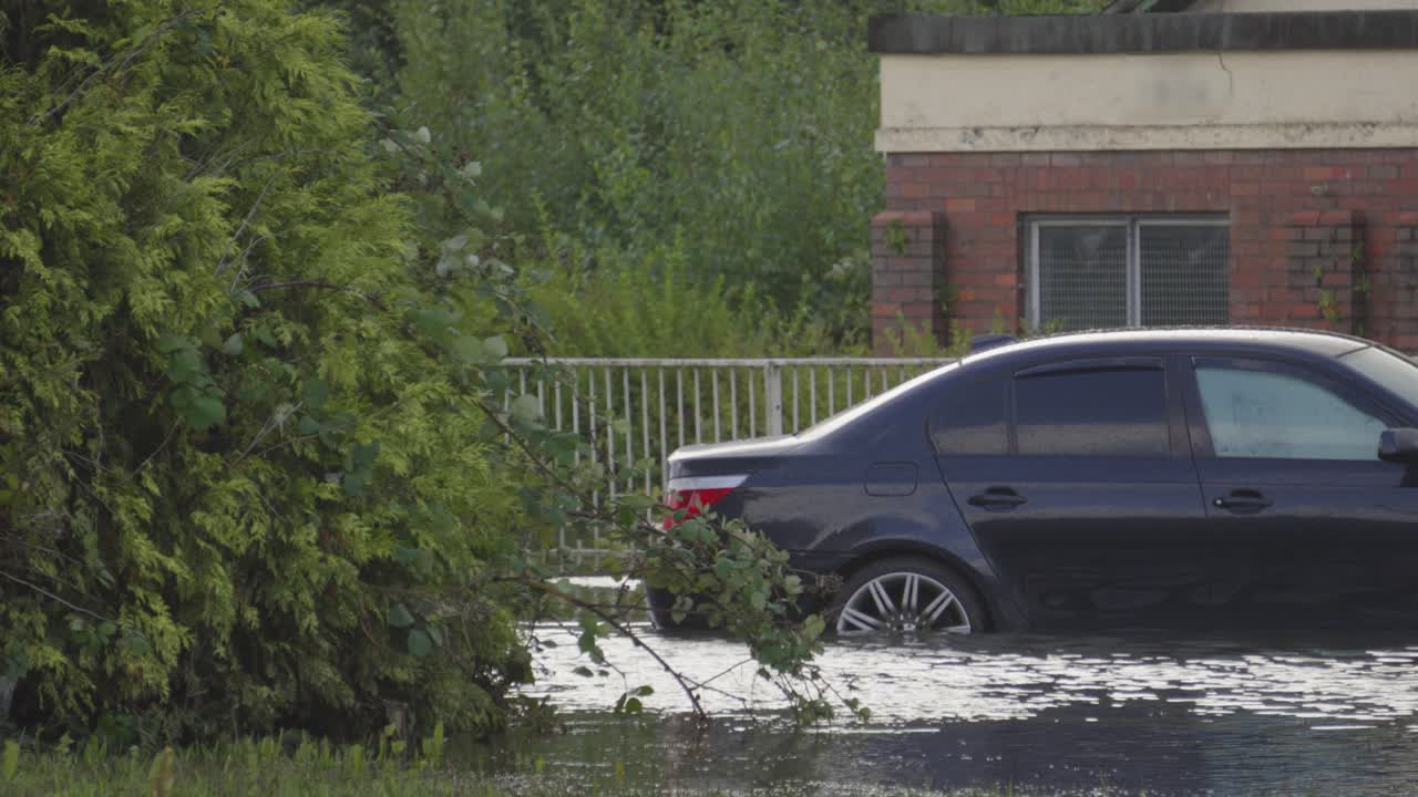 Car submerged in flood water