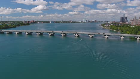 establishing shot of the douglas macarthur bridge over the detroit river