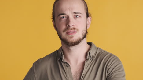 caucasian young man thinking and agreeing on camera.