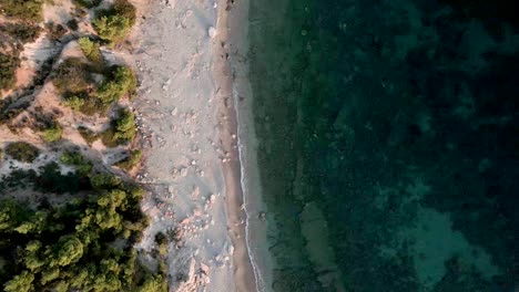 Picturesque-Beach-With-Turquoise-Sea-Water-On-Greek-Island-In-Summer