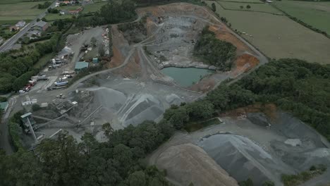 Aerial-high-angle-shot-flying-over-quarry-in-Mil-de-Baixo,-Moeche,-Spain